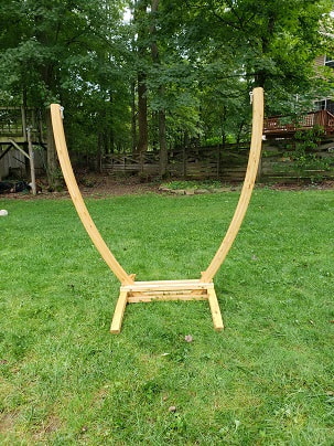 Cypress wood hammock stand made of laminated cypress wood and marine varnished.  Suspension hardware is galvanized steel and the stand is 13 feet long