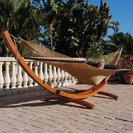 Siberian Larch Wood hammock stand made of laminated Siberian Larch wood.  Suspension hardware is galvanized steel.  The stand is 13 feet long